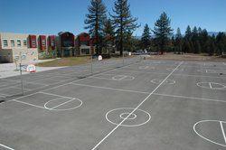 Resurfaced and re-lined basketball courts at a Truckee-area school.